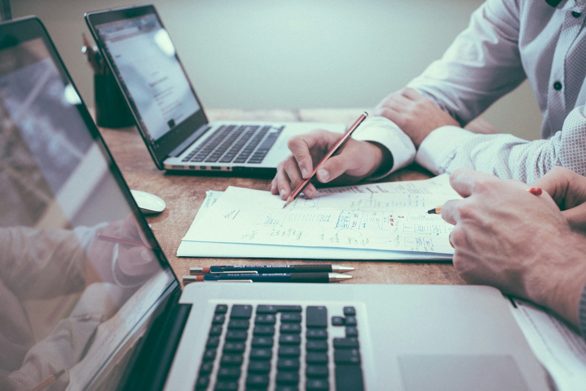 People collaborating at a desk